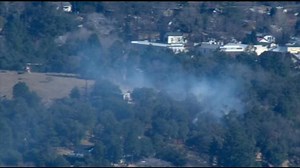 Shed fire in Julian spreads to bushes