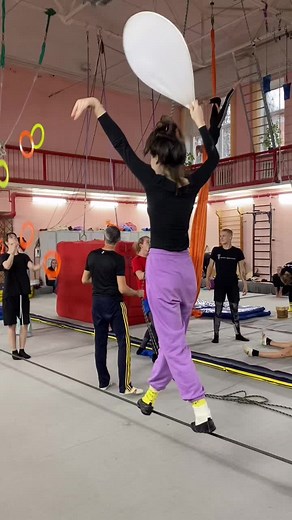 Indoor Aerial Silk Acrobatics Performance in Gymnasium