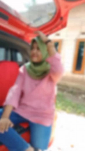 Stylish Summer Look in a Red Car Trunk