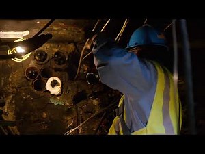 Con Edison Crew Working Underground in a NYC Manhole