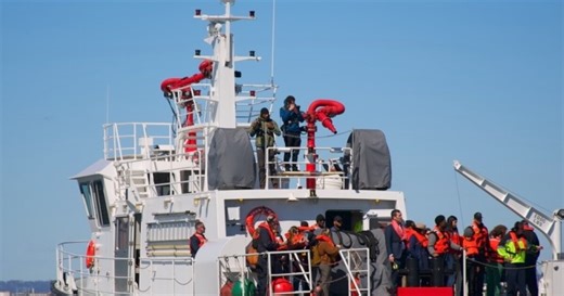 Families of collapse victims hold memorial where Key Bridge once stood
