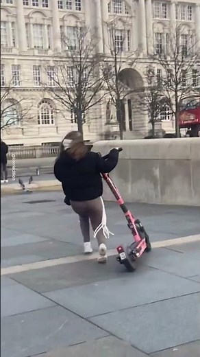 Girl Falls Off Electric Scooter 🤣