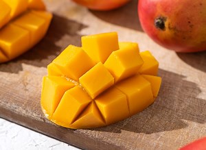 Secret Side Effects of Eating Mango, Says Dietitian