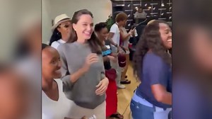 Angelina Jolie breaks out the Electric Slide at daughter’s college