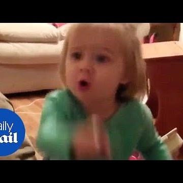 Hilarious moment jealous kid demands parents stop kissing - Daily Mail