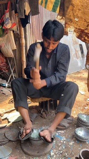 Rounding the tin part with a hammer