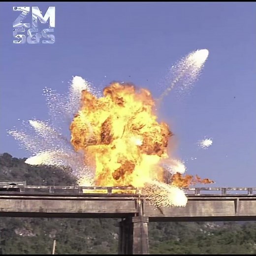 Rambo's Explosive Arrows Takes Out Enemy Trucks on a Bridge in Rambo II