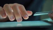 Using credit card and digital tablet to buy online shopping,Close up