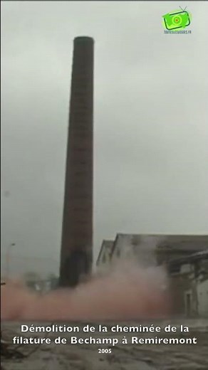Explosifs pour détruire une grande cheminée d'usine