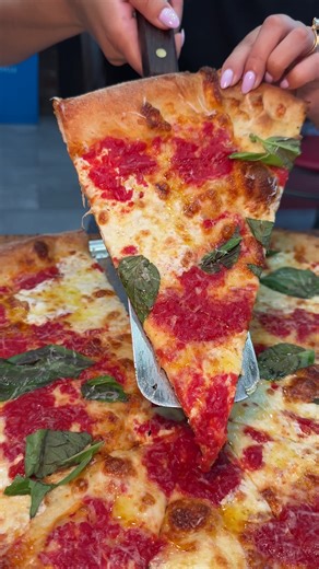 Tangy crust, bright tomato, and fresh basil define MARGHERITA SOURDOUGH PIZZA, timeless and craveable! 🍕🍅🌿 #NUOVOYORKPIZZA #NYC 📍105 East 9th Street, New York, NY