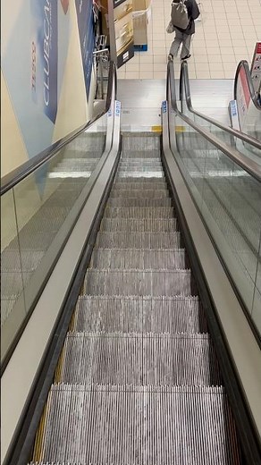 Kone Escalator ride down at Tesco Express in Oxford City Centre (Originally Borders Bookstore).