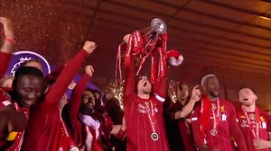 Liverpool lift the Premier League trophy