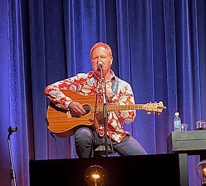 Nashville songwriter Tim Nichols giving the back story and performing his Hit song Live Like You We’re Dying, cut by Tim McGraw. | Leigh Savage