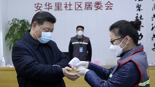 Chinese president makes public appearance wearing mask