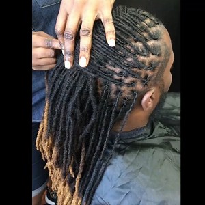 Interlocking with loc styling. What is INTERLOCKING? Interlocking is a maintenance technique in which the end of the loc is pulled through the root to tighten the nugrowth to the scalp. In this case, the client only comes in for maintenance every 8 weeks as appose to once a month because of the palm rolling technique. Hair can be shampooed and also styled during this time but there is no need for maintenance | Karibbean Kinks Natural Hair Salon