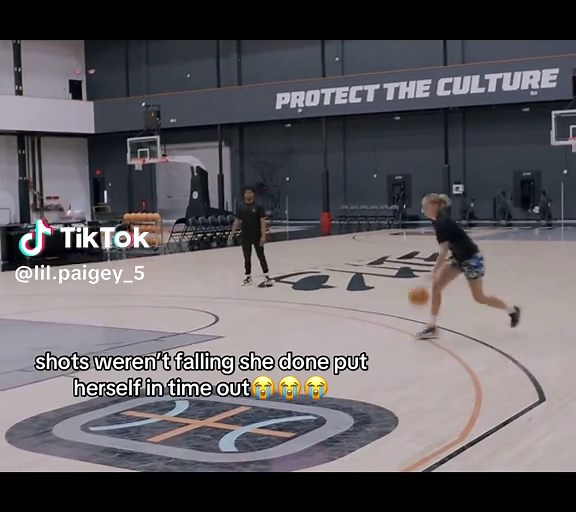 Paige Bueckers Adjusts Basketball Hoop Height