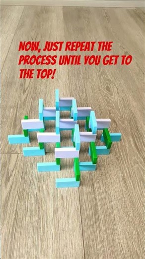 How to build a domino pyramid in 22 seconds or less!