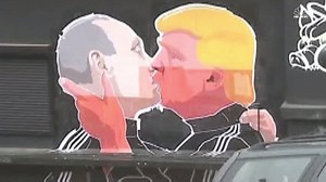Artist explains why he painted the mural of Donald Trump kissing Russian President Vladimir Putin. Read more: http://nbcnews.to/1sntwm8 | NBC News