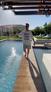 14K views · 257 reactions | Yes, that wood-look bridge is actually tile—designed to float over the pool and turn a functional feature into a standout moment. Durable, low-maintenance, and undeniably stunning.  Comment “book” to schedule your free design & build consultation today.  #luxuryoutdoorliving #backyardtransformation #pooldesign #dreamhome #backyardgoals | Foxterra Design | Facebook