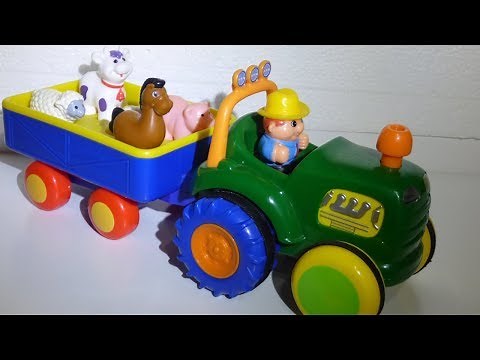 Kiddieland Old MacDonald had a Farm Tractor toy with Trailer, songs, animal sounds