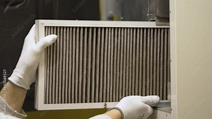 hvac filter replacing. Replacing the filter in the central ventilation system, furnace. Replacing Dirty Air filter for home central air conditioning system. Change filter in rotary heat exchanger