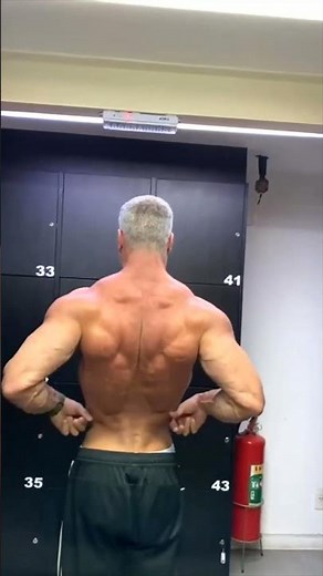 50 years old bodybuilder / Flexing & posing his amazing Aesthetic muscles #shorts