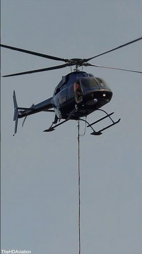 Bell 407 Helicopter - Scooping Water - Wildfire Fighting