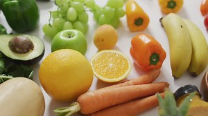 Premium stock video - Video of fresh fruit and vegetables on white background