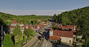 Helen Georgia Aerial v8 cinematic low drone flyover small mountain town along the main street capturing charming Bavarian-style architectures and lush greenery - Shot with Mavic 3 Cine - October 2022