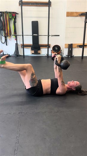 Kettlebell dead bug (with band)
