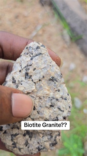 Biotite Granite Biotite granite is a coarse-grained intrusive igneous rock composed mainly of quartz, feldspar (both plagioclase and K-feldspar), and biotite mica as the dominant dark mineral. It typically forms deep within the continental crust as a result of slow cooling and solidification of silica-rich magma. Key Characteristics • Texture: Phaneritic (coarse-grained); crystals visible to the naked eye • Color: Generally light-colored (grey to pink), speckled with black biotite flakes • Major