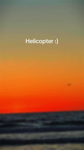 Army Helicopter Returning to Base Over the Ocean