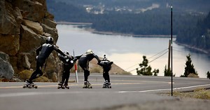 Watch a POV skateboarding run down a mountain road