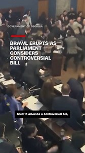 Lawmakers in Georgia came to blows in the country's parliament when ruling party members tried to advance a controversial bill, Reuters reports. | CNN International