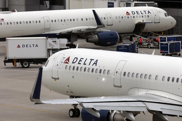 US is investigating Delta's flight cancellations and faltering response to global tech outage