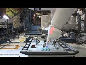 R2 Operating a taskboard on the ISS