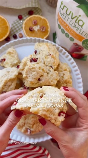 Emily Barlow | Home & Food Blogger on Instagram: "Comment SCONE below for these amazing reduced sugar cranberry orange cream scones using @Truvia sweetener! #TruviaPartner These scones are bursting with the flavors of tart, fresh cranberries, orange zest and creamy, subtle sweetness. The texture is so fluffy and they are quick and easy to make. Perfect for sharing and enjoying as a breakfast, snack or dessert this holiday season. Truvia Sweet Complete Granulated is a cup-for-cup replacement for 