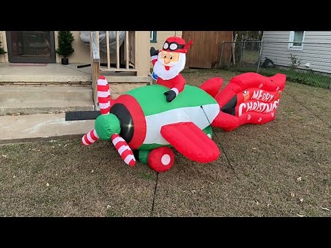 Christmas inflatable Santa on airplane 🎄