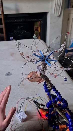 Interactive Light-Sensitive Mechanical Flower Sculpture