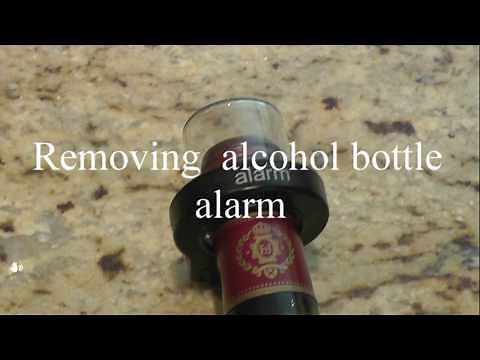removing alcohol bottle security alarm lock