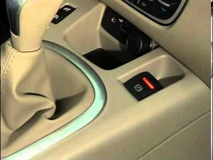 How to manually release the handbrake of the Renault Grand Scenic?