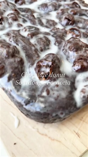 Chocolate Donut Sourdough Focaccia 60 Grams Dutch Process cocoa powder 115 Grams warm water -combine and let the cocoa powder bloom for 5 to 10 minutes Focaccia Recipe: 100 Grams Sourdough Starter 430 Grams room temperature water and mix well. Then add- 16 Grams Olive or Avocado Oil (personal preference) 28 Grams Honey 40 grams Granulated Sugar 12 Grams Salt 520 Grams Flour -Mix thoroughly and scrape down bowl. -Cover bowl and leave for 1 hour. -After 1 hour wet hands and complete a set of stret