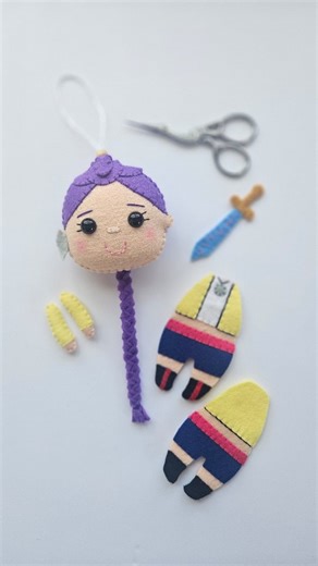 Jill | The Felted Fawn 🇨🇦 on Instagram: "This slow, methodical work is definitely an ongoing exercise in trusting the process. And sometimes it's not easy! But it is so worth it when it all comes together! #thefeltedfawn #kpopdemonhunters #rumi #handmadewithlove #cute #christmasornaments #handmadechristmas #felt"