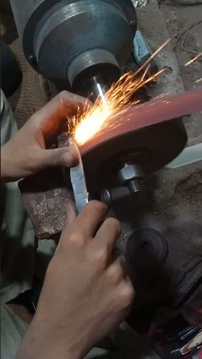 knife sharpening on sanding belt