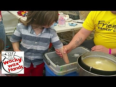 Dipping hands in WAX , Kids keepsake idea Northern Ireland