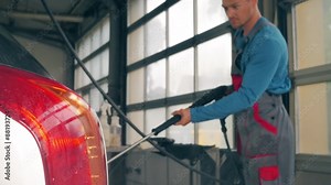 Man washing car on a car wash