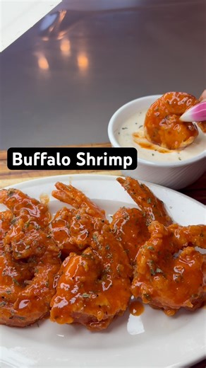 Buffalo fried shrimp. Crispy, saucy, and seasoned just right. Ranch or blue cheese?