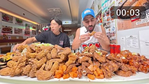 Two Competitive Eaters Takes on 300 Wings Challenge