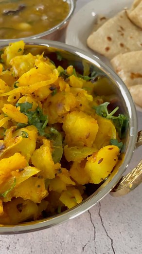 🧿 Shruti Desai Naik 🧿 | Vegetarian Recipes Creator on Instagram: "Sukhi Bhaji Or Potato Curry!! Bringing you my most favorite person my mom’s recipe Sukhi Bhaji or Bataka ni sukhi bhaji nu shak. She makes this the best everytime after Jaya Parvati Vrat she used to make this for me. This is so simple though delicious recipe you should try. This can be served with Roti, rice or dal. This is perfect tiffin idea for working people and kids lunchbox too. If you like do share and save this recipe. .