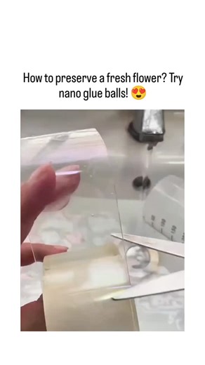 TrendSnap on Instagram: "This X post features a 15-second DIY tutorial showing hands encapsulating a pink flower in clear gel using "nano glue" under running water, resulting in a decorative orb that preserves the bloom's vibrancy without wilting. , an account focused on ASMR and satisfying videos, the clip has exploded to nearly 1 million views in under 24 hours, sparking 289 replies mostly with Amazon affiliate links for nano tape products. The technique draws from a 2024 social media trend us